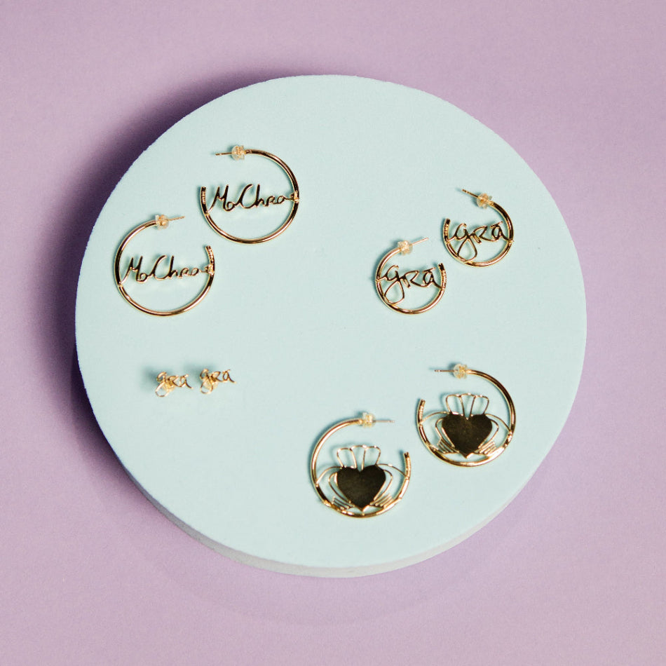 Display of Gold Heart Strong Claddagh Hoop Earrings, Mo Chroi Hoop Earrings,  Gra Hoop Earings and Gra Beag Earrings